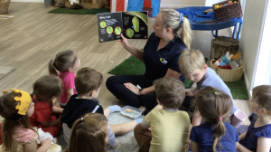 Children captivated by butterfly project